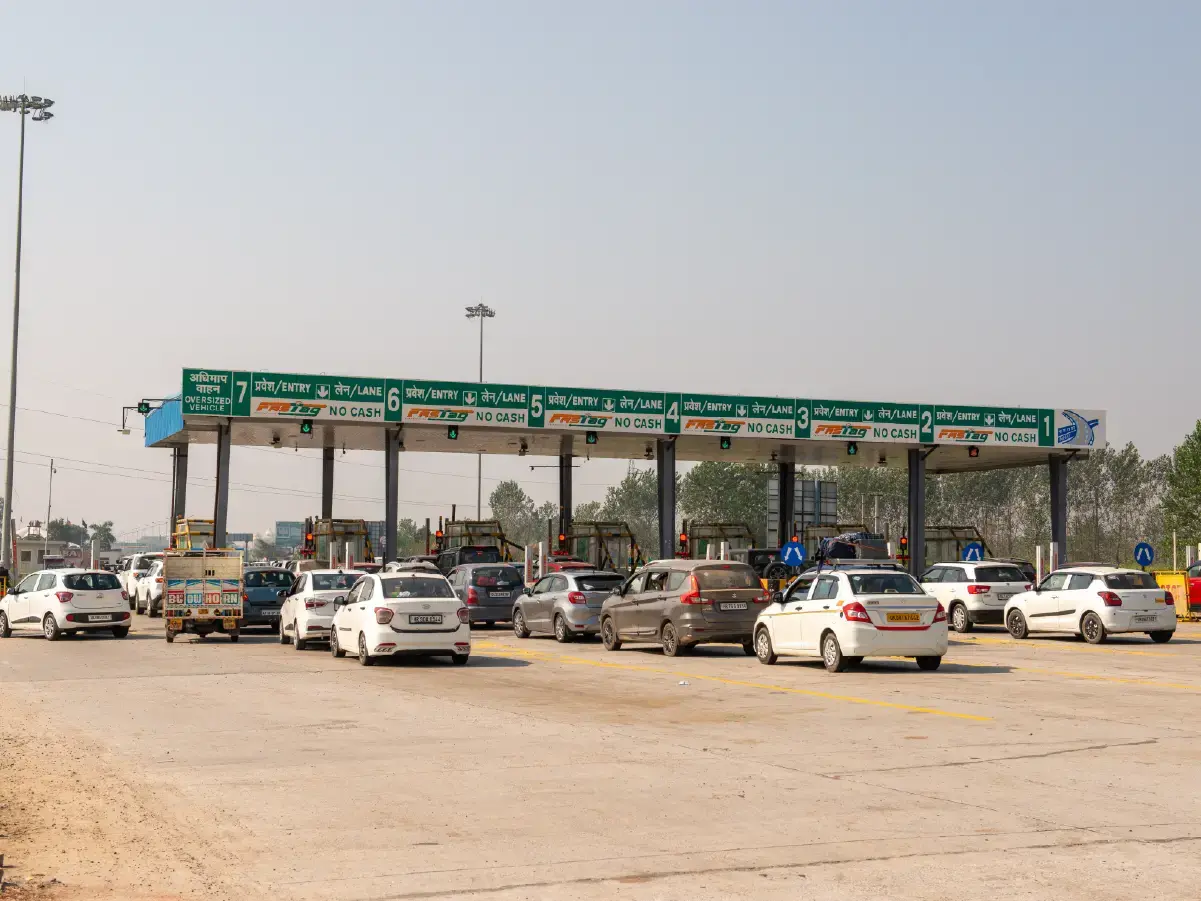Vehicles waiting to pass through National Highway Toll Plaza