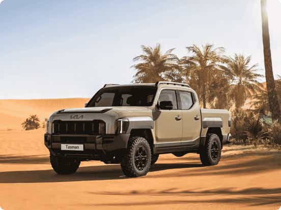 upcoming new 2025 kia tasman pickup truck revealed front three quarters design view