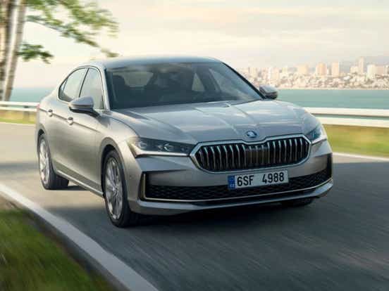 new 2025 skoda superb front driving shot