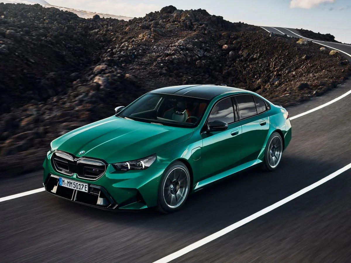 new 2025 bmw m5 hybrid green driving front design