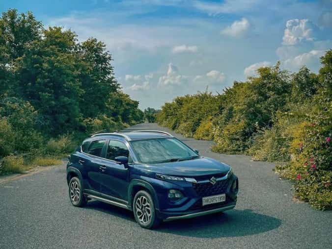 2025 maruti suzuki fronx blue top reasons to buy review amit