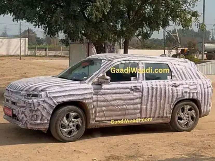 upcoming 2025 maruti suzuki grand vitara 7 seater spy shots front gaadiwaadi