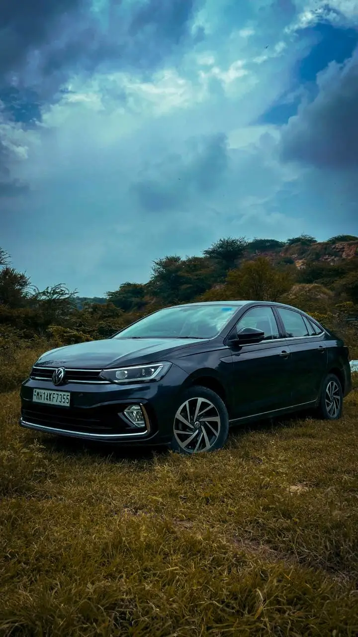 2025 volkswagen virtus review pros cons sedan grey amit