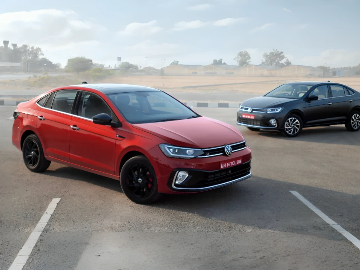 Volkswagen Virtus Wild Cherry Red front three-quarter view.