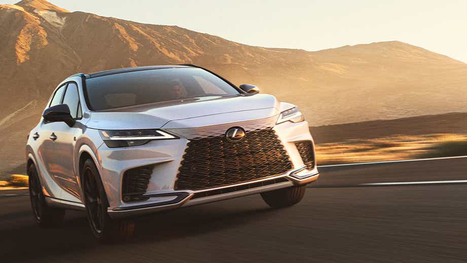 front view of a Lexus RX on a scenic road