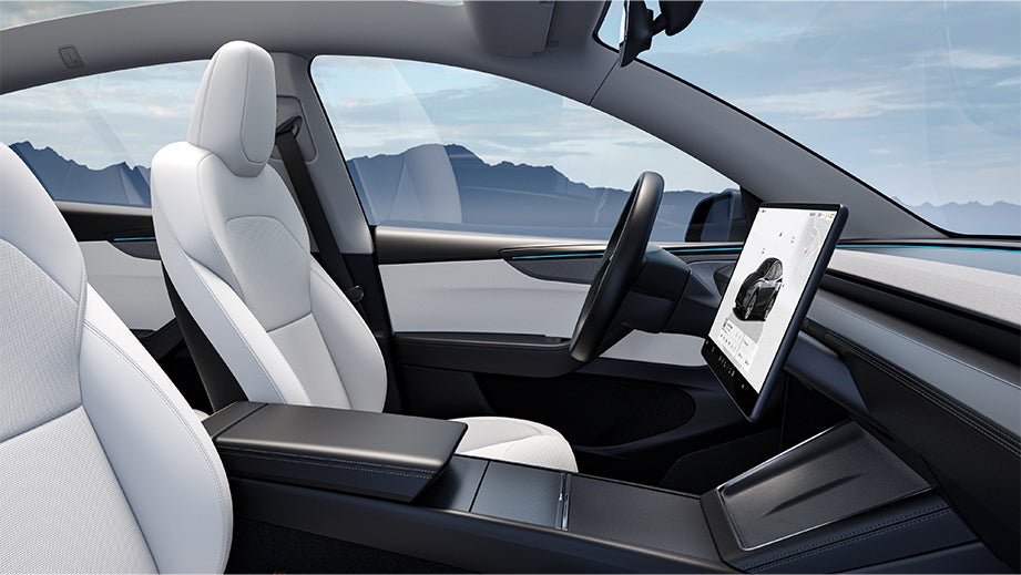 interior front seat and dashboard of a Tesla Model Y
