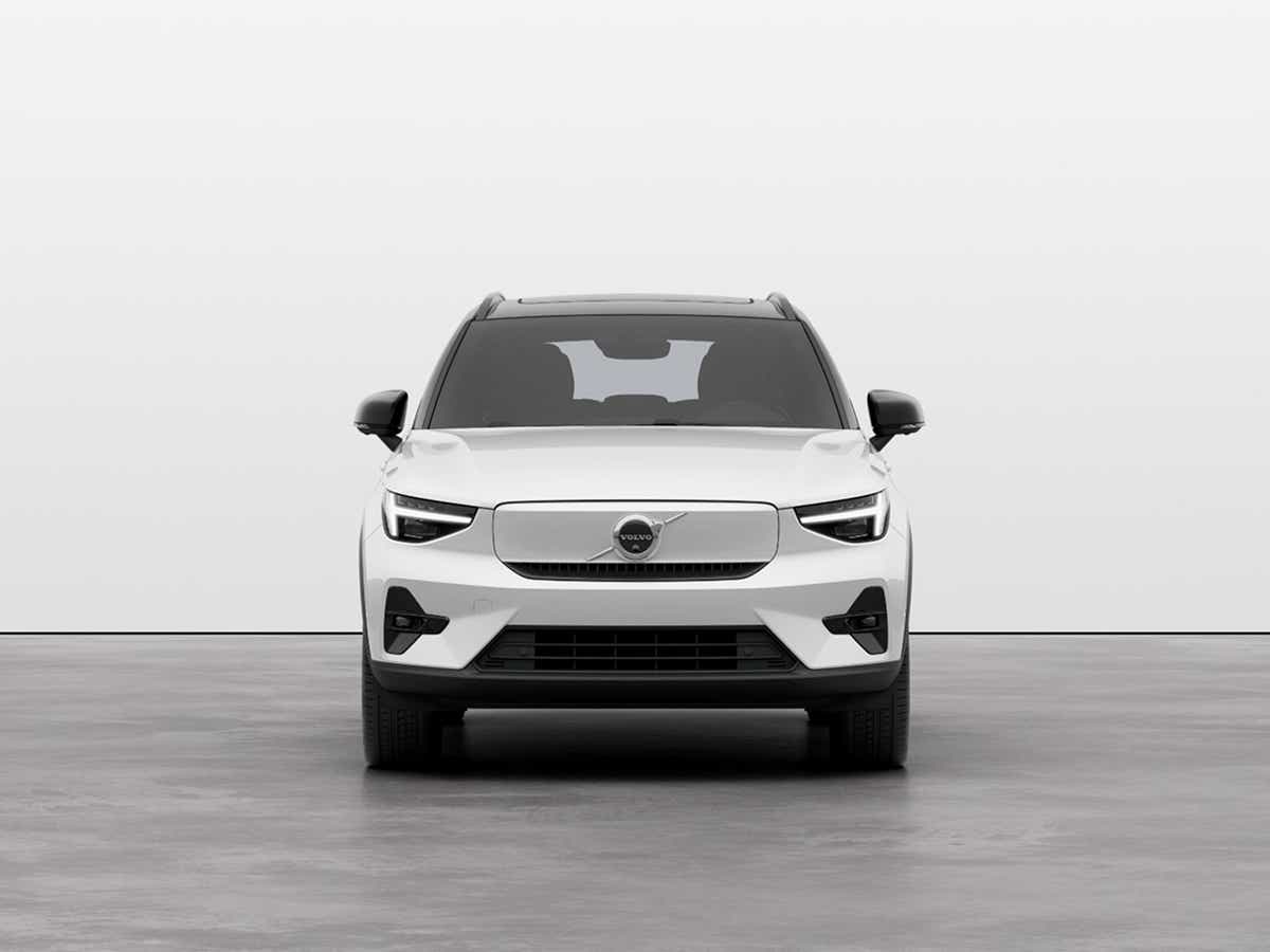 Front view of a Crystal White Volvo EX40