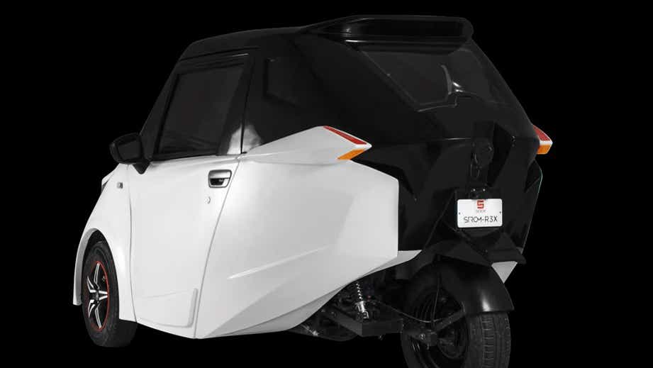 rear three-quarter of a White With Black Roof Strom Motors R3