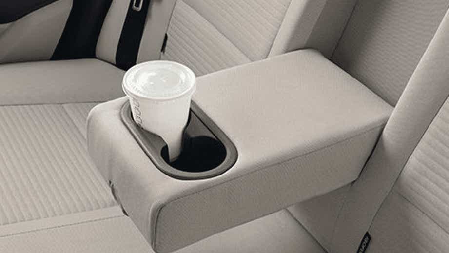 Rear seat armrest with cup holder of a Hyundai Aura