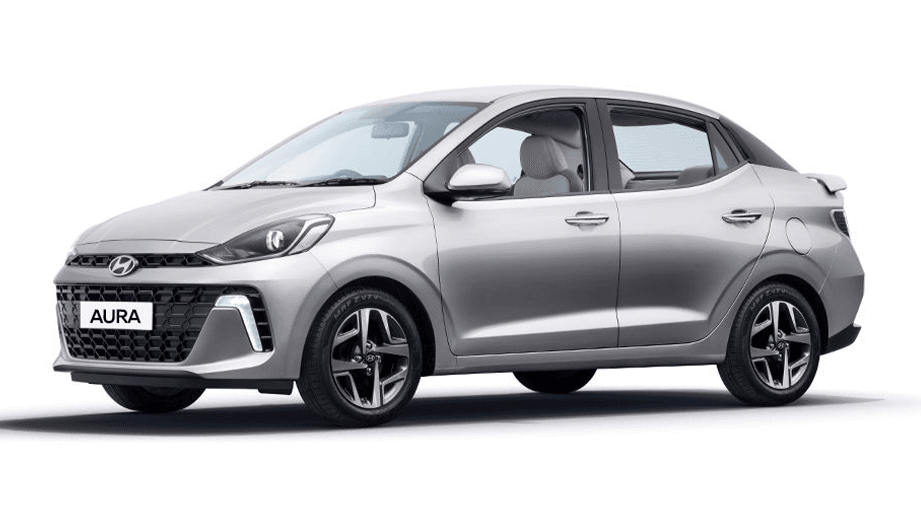 front three-quarter view of a Typhoon Silver Hyundai Aura