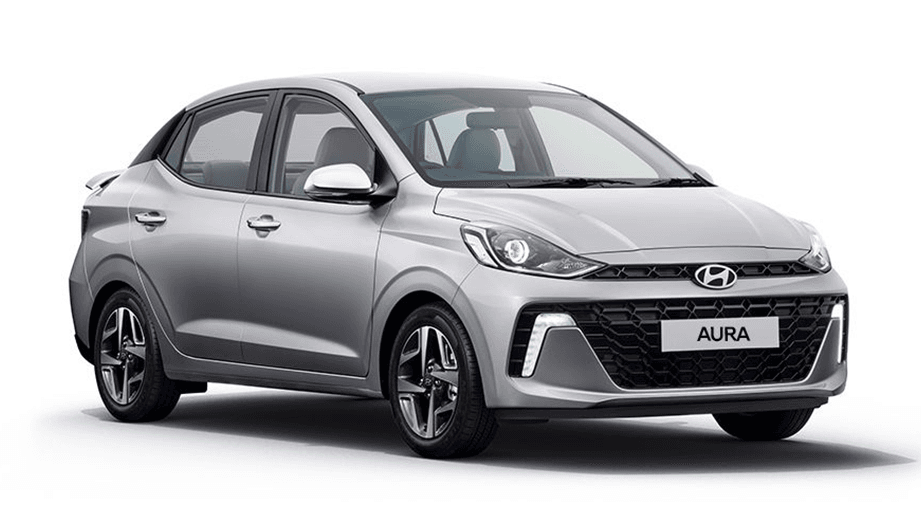 front three-quarter view of a Typhoon Silver Hyundai Aura