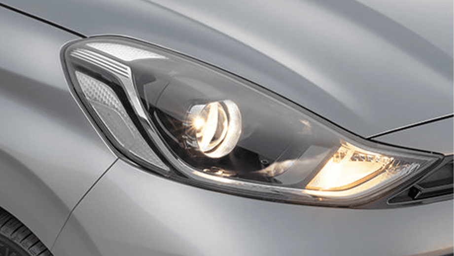 Headlight close-up of a Hyundai Aura