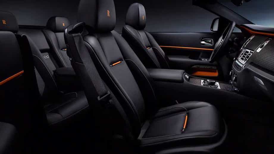 interior dashboard and seats of a Sunny Yellow Rolls-Royce Dawn