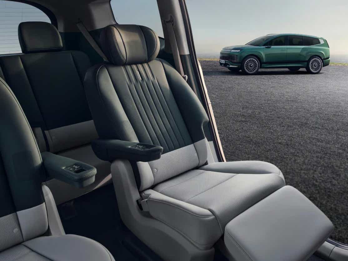 Interior seating with view of a Hyundai IONIQ 9 parked outside