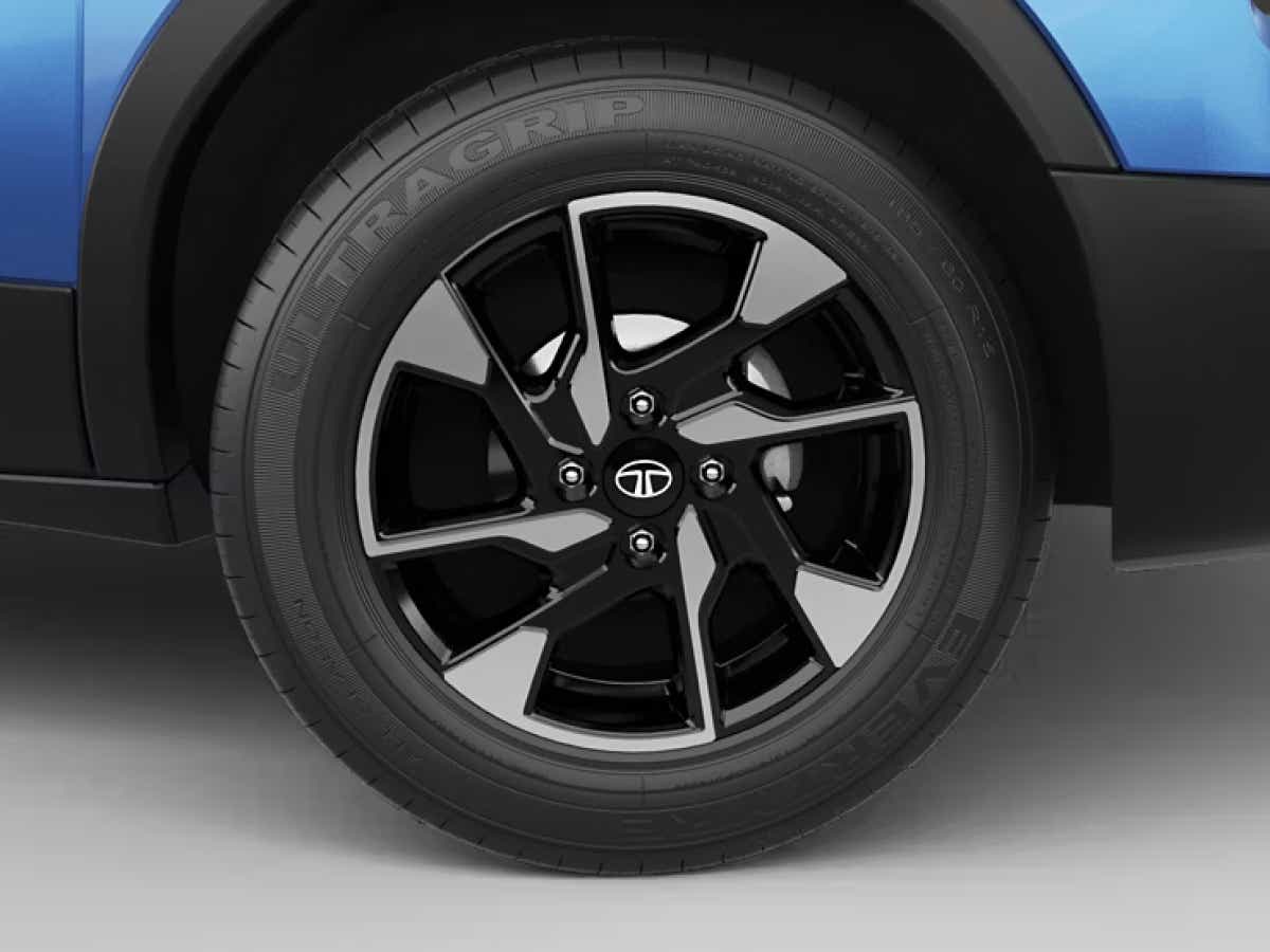 Front wheel close-up of a Black Tata Punch Facelift