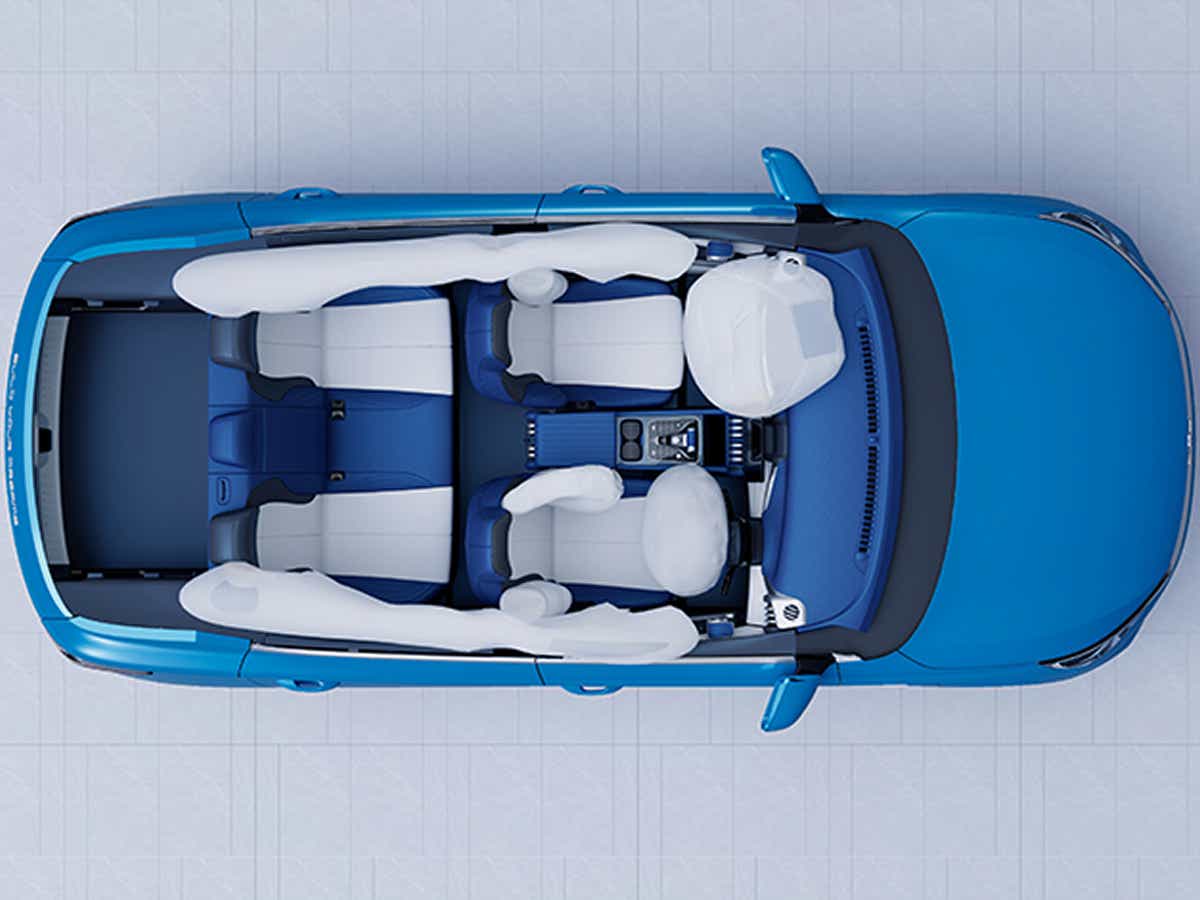top view of a Surf Blue BYD Atto 3 Facelift interior with airbags deployed