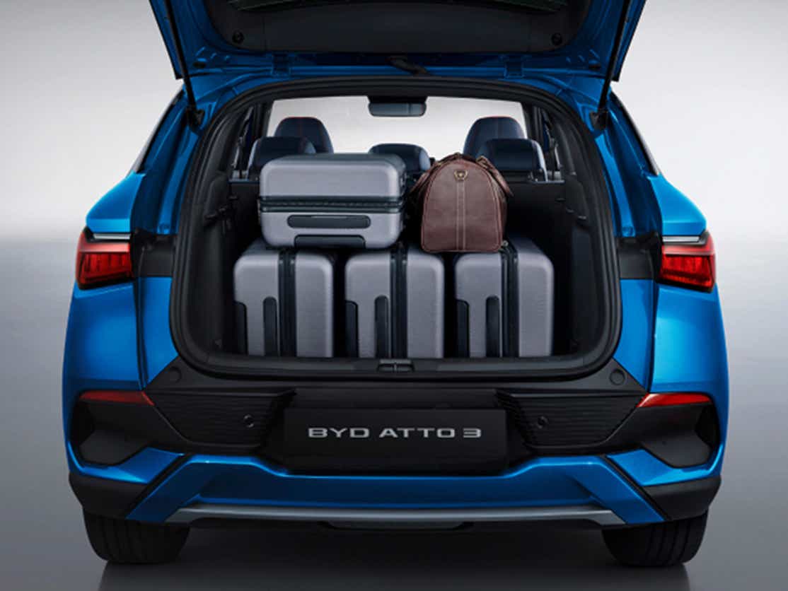 boot space view of a Surf Blue BYD Atto 3 Facelift with luggage