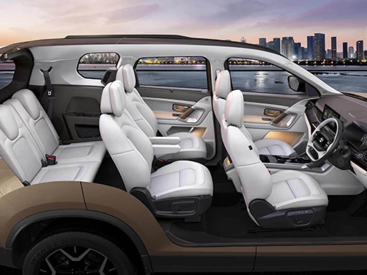 interior side view of a Tata Safari EV highlighting all three rows of seats