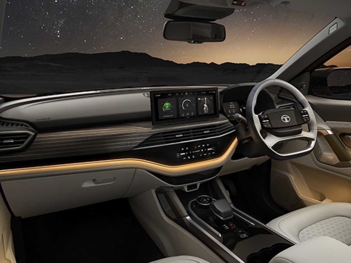 Interior dashboard of a Black Tata Safari EV
