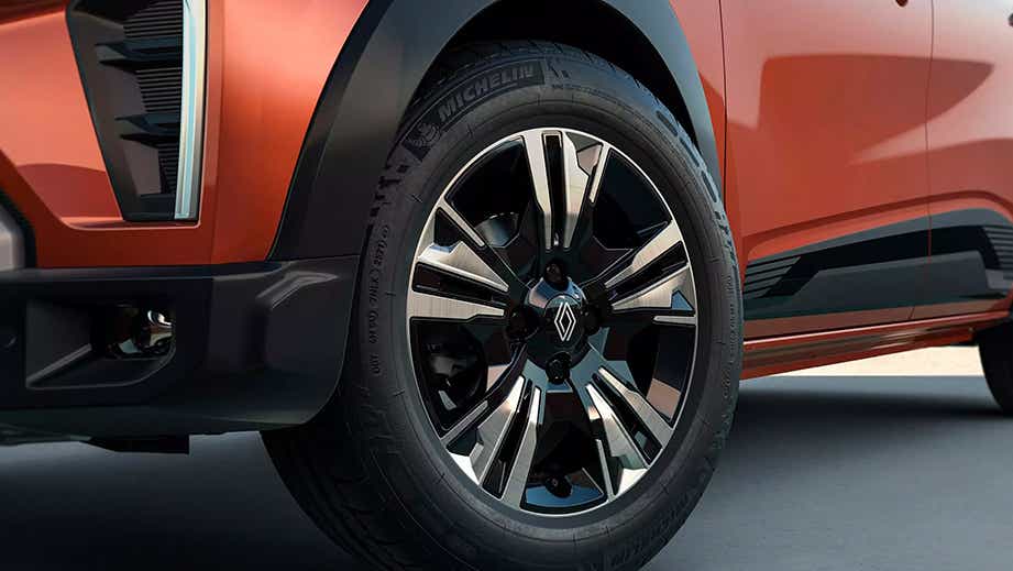 Front wheel close-up of a Amber Terracotta Renault Triber