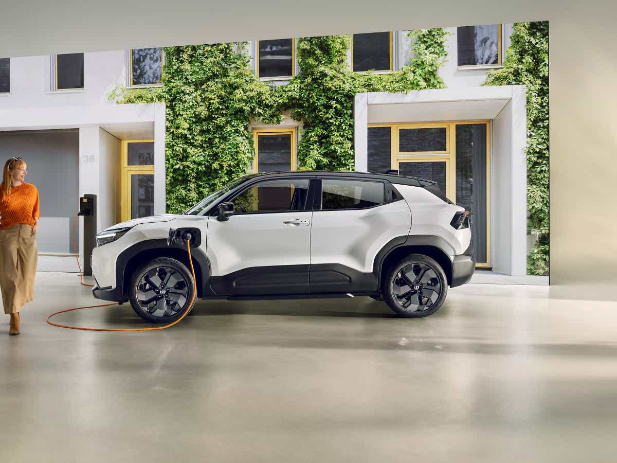 side profile of a Toyota Urban Cruiser EV charging