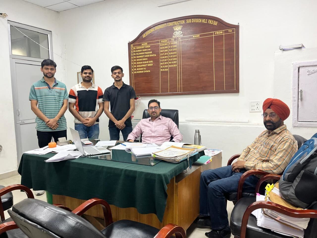 Students from Project Rakshak standing with PWD officials in Rupnagar during a safety audit.