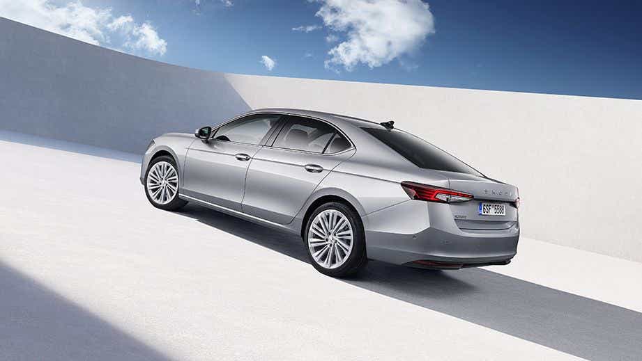 rear three-quarter view of a Steel Grey Skoda Superb