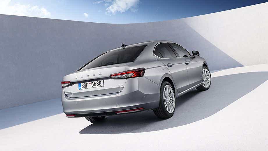 Rear three-quarter view of a Steel Grey Skoda Superb