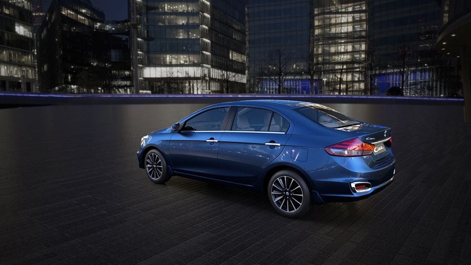 rear three-quarter of a Nexa Blue Maruti Suzuki Ciaz