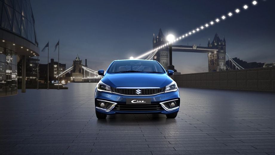 front view of a Nexa Blue Maruti Suzuki Ciaz