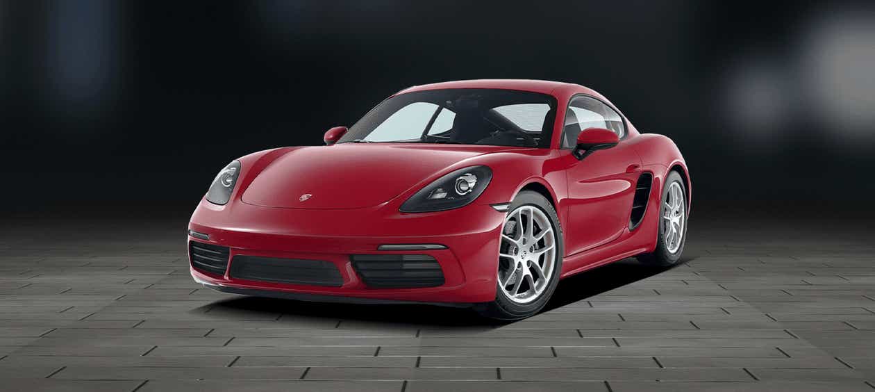 front three-quarter view of a Guards Red Porsche 718
