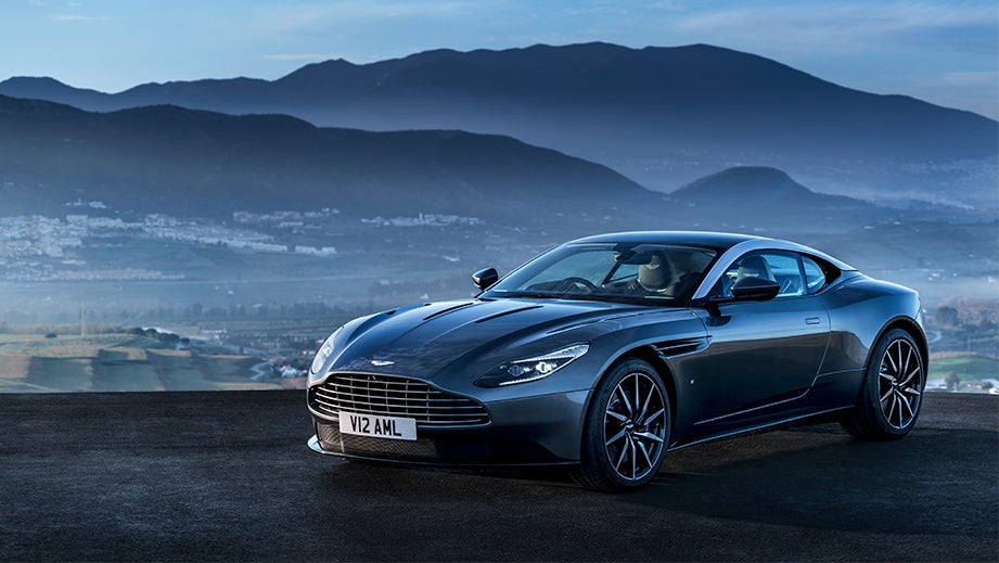front three-quarter view of a Tiffany Green Aston Martin DB11