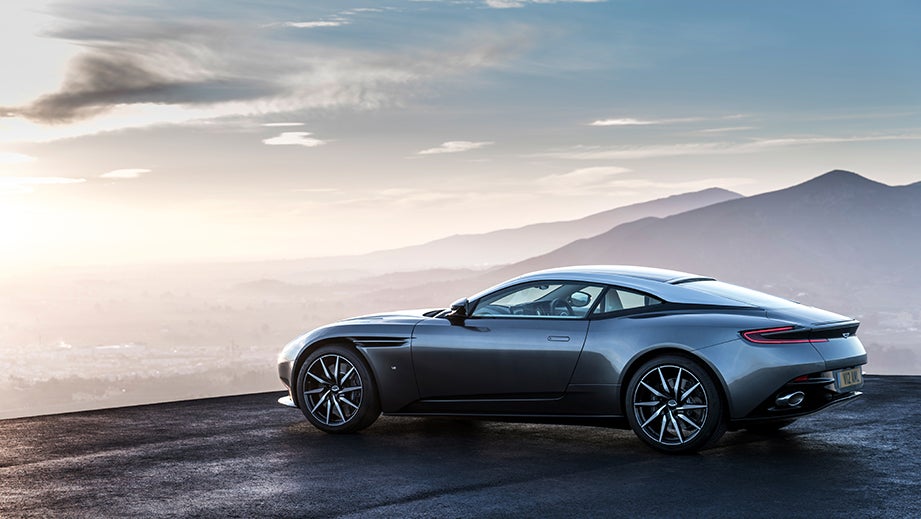 rear three-quarter view of a Tiffany Green Aston Martin DB11