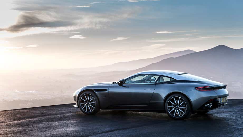 rear three-quarter view of a Tiffany Green Aston Martin DB11