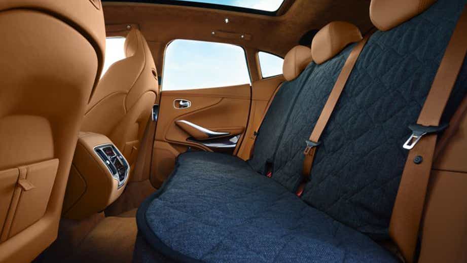 Rear seat and interior view of an Aston Martin DBX