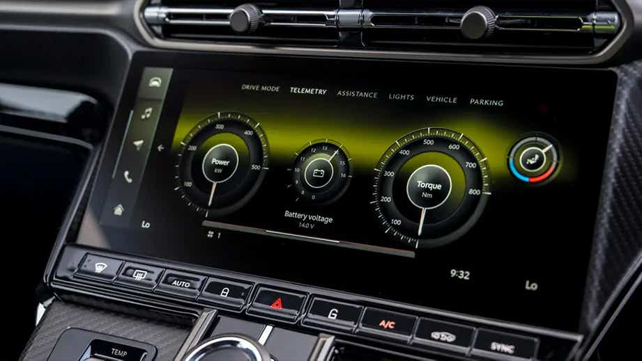 Infotainment touchscreen dashboard of an Aston Martin Vantage
