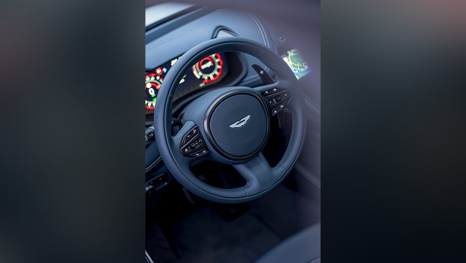 Steering wheel and dashboard of an Aston Martin DBX