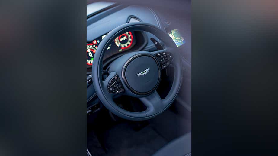 Steering wheel and dashboard of an Aston Martin DBX
