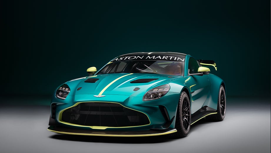 Front view of a Sunburst Yellow Aston Martin Vantage