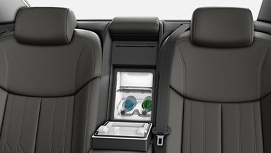 Rear seat center console view of a Vesuvius Gray Metallic Audi A8 L