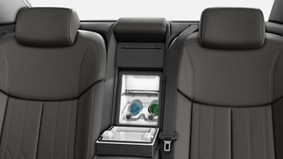 Rear seat center console view of a Vesuvius Gray Metallic Audi A8 L