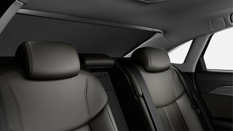 Rear seat view of a Vesuvius Gray Metallic Audi A8 L