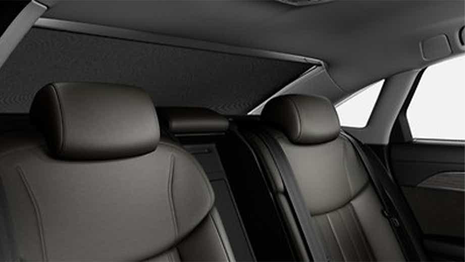 Rear seat view of a Vesuvius Gray Metallic Audi A8 L