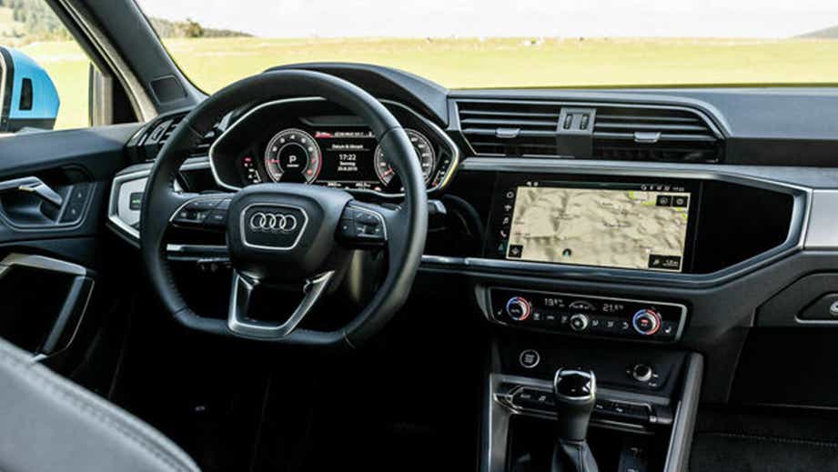 Dashboard and steering wheel view of an Audi Q3 Sportback