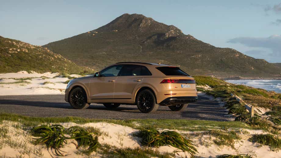 rear three-quarter view of a Audi Q8
