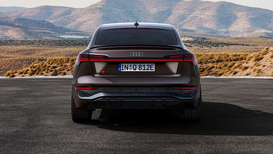 rear view of a Madeira Brown Metallic Audi Q8 Sportback e-tron
