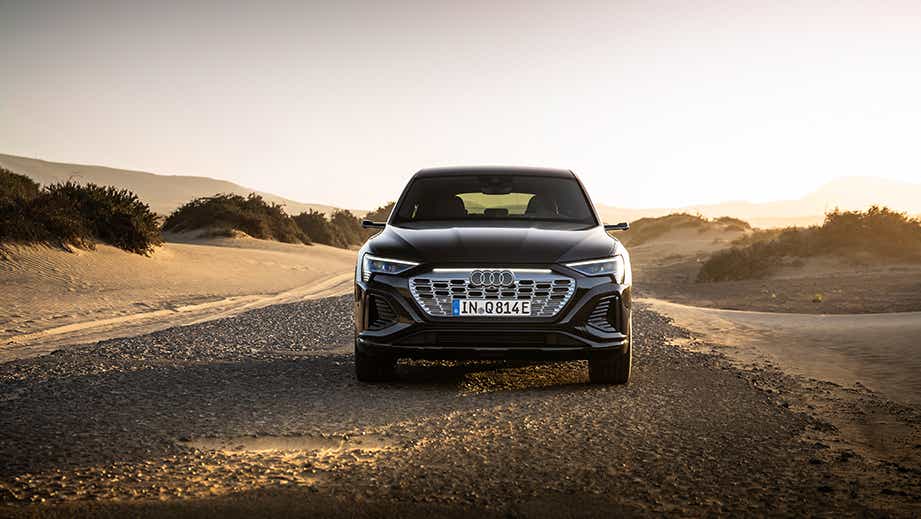 Front view of an Audi Q8 Sportback e-tron on a desert road