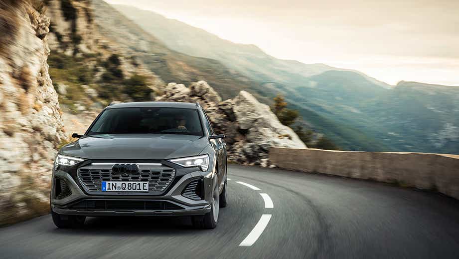 front view of a Audi Q8 e-tron on a mountain road