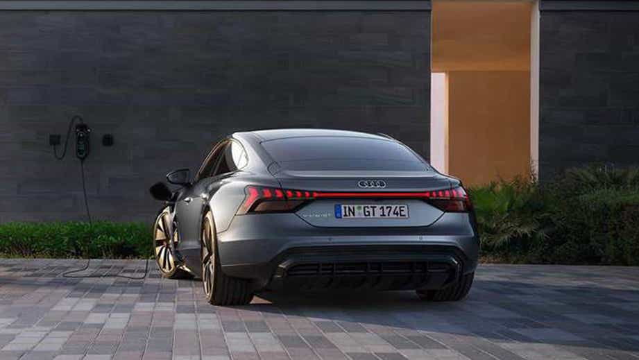 Rear view of a Mythos Black Metallic Audi RS e-tron GT