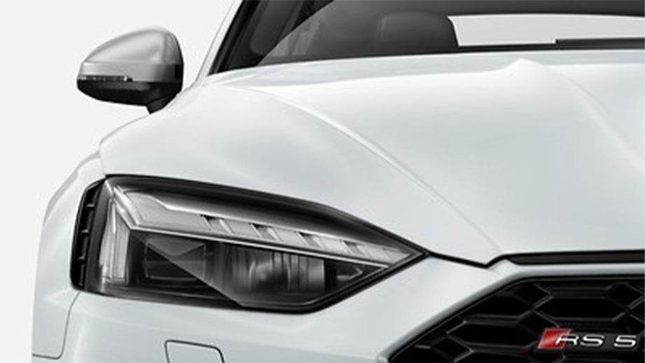 Front headlight and grille of a Naldo Grey Audi RS5